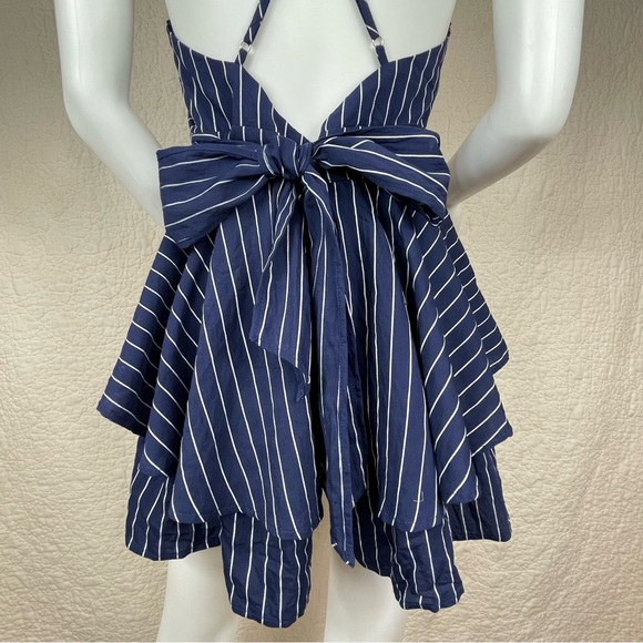 🔥Lulus Ruffle & Flow Black Striped Backless Ruffle
Romper Blue White - Picture 7 of 16